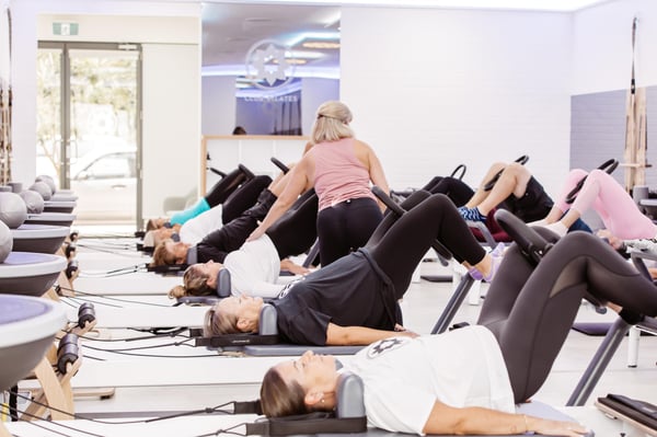 The Club Pilates Way: Connection Through Disconnection
